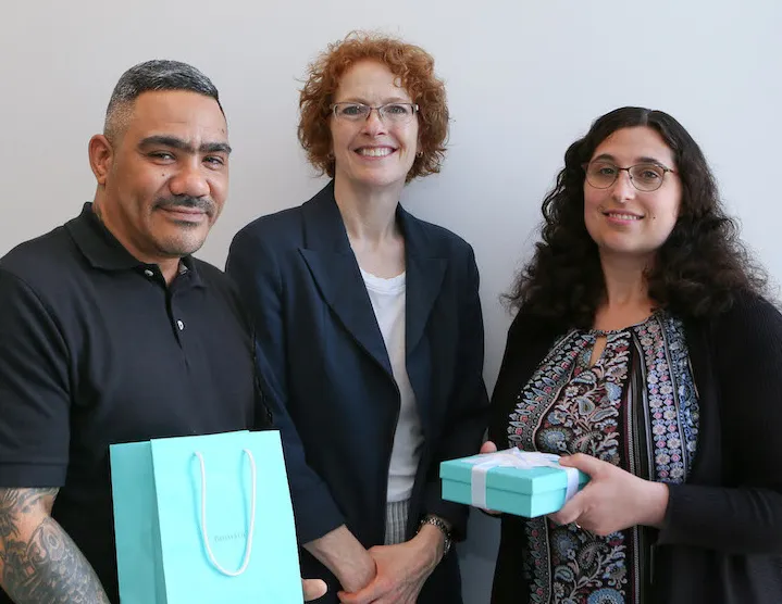 John Soto and Lisa Genoese pose with Dean Lester and their STAR awards